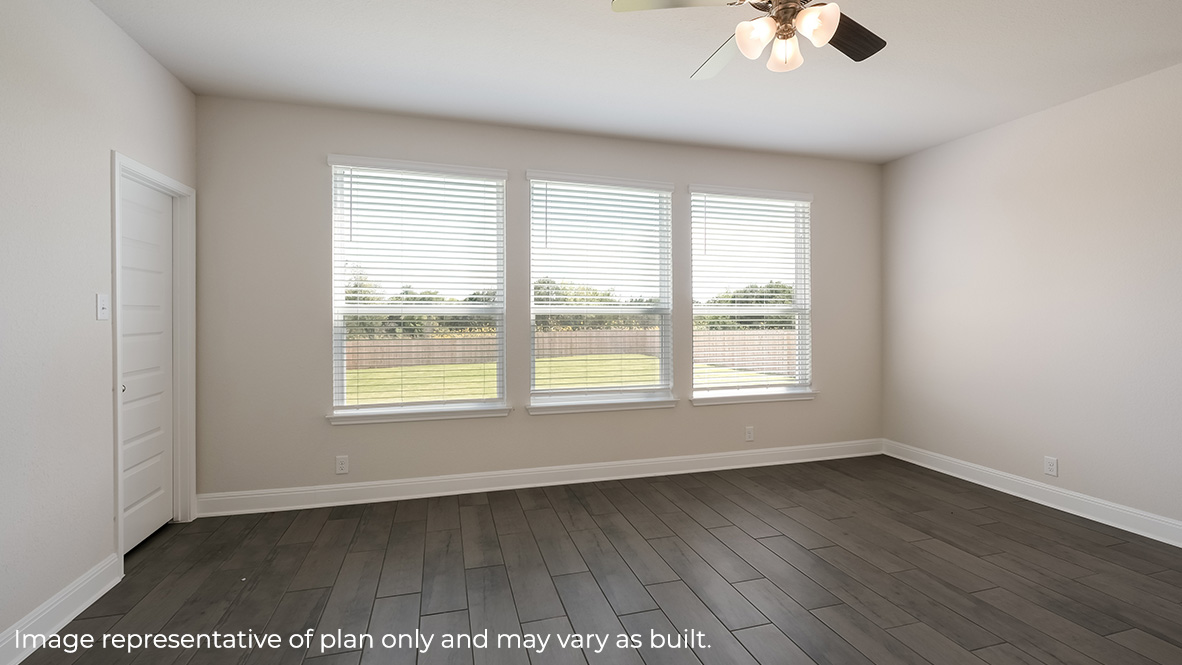 living room with large windows and hard surface flooring