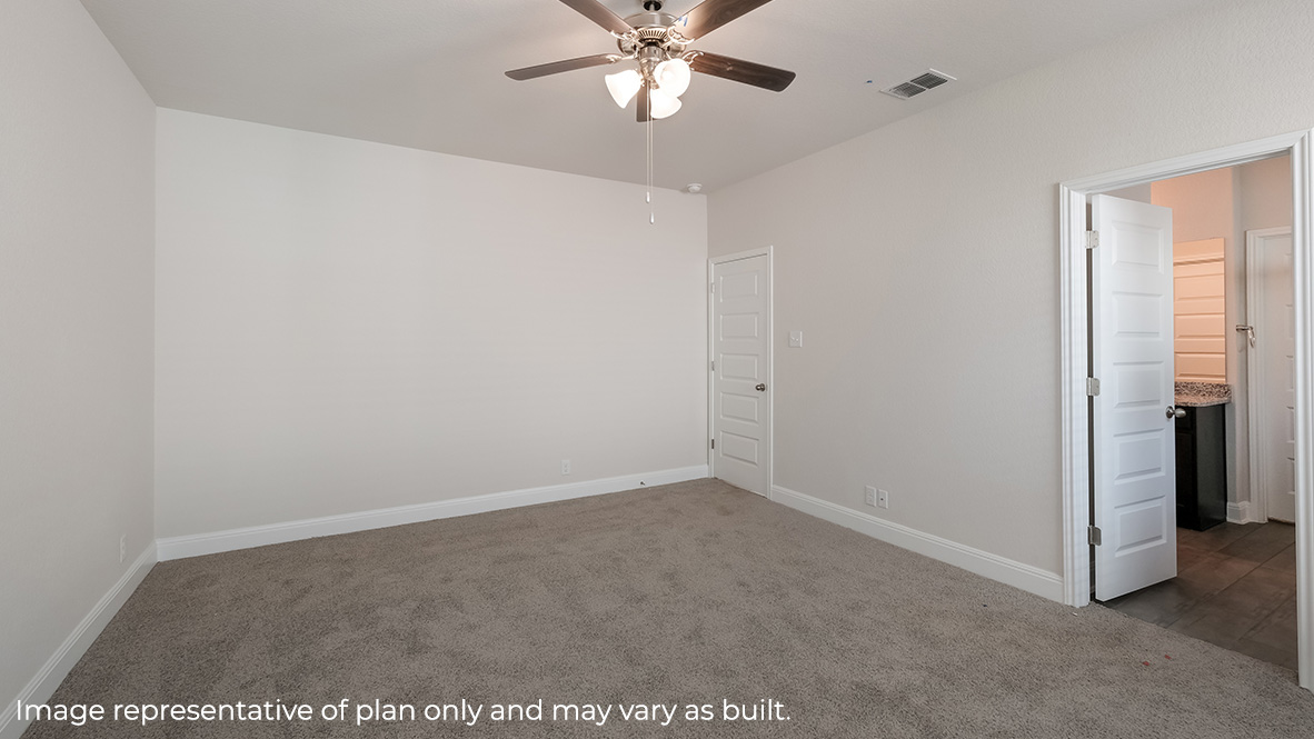 main bedroom suite with large windows, ceiling fan, carpet and ensuite bathroom