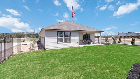 fully landscaped and irrigated back yard