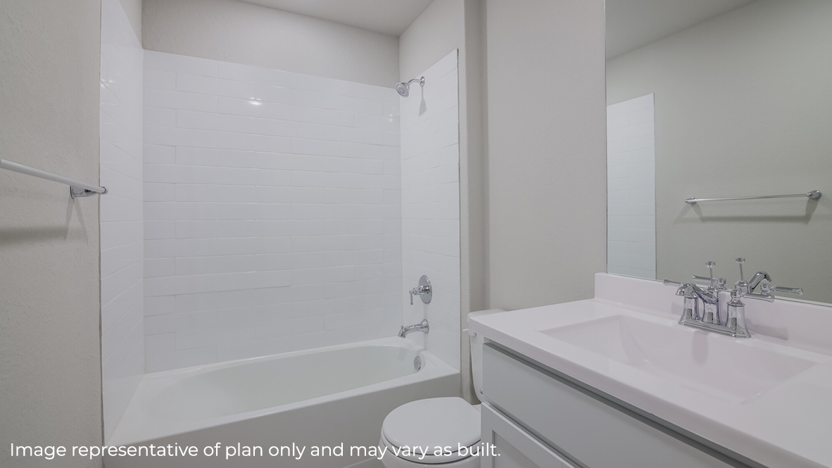 Second full bathroom with combined bathtub and shower, toilet, and single vanity sink.