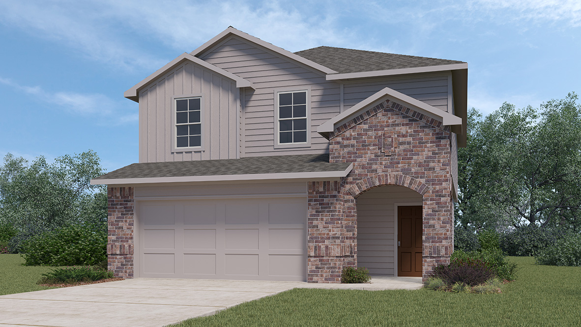2 story home with brick exterior and two car garage