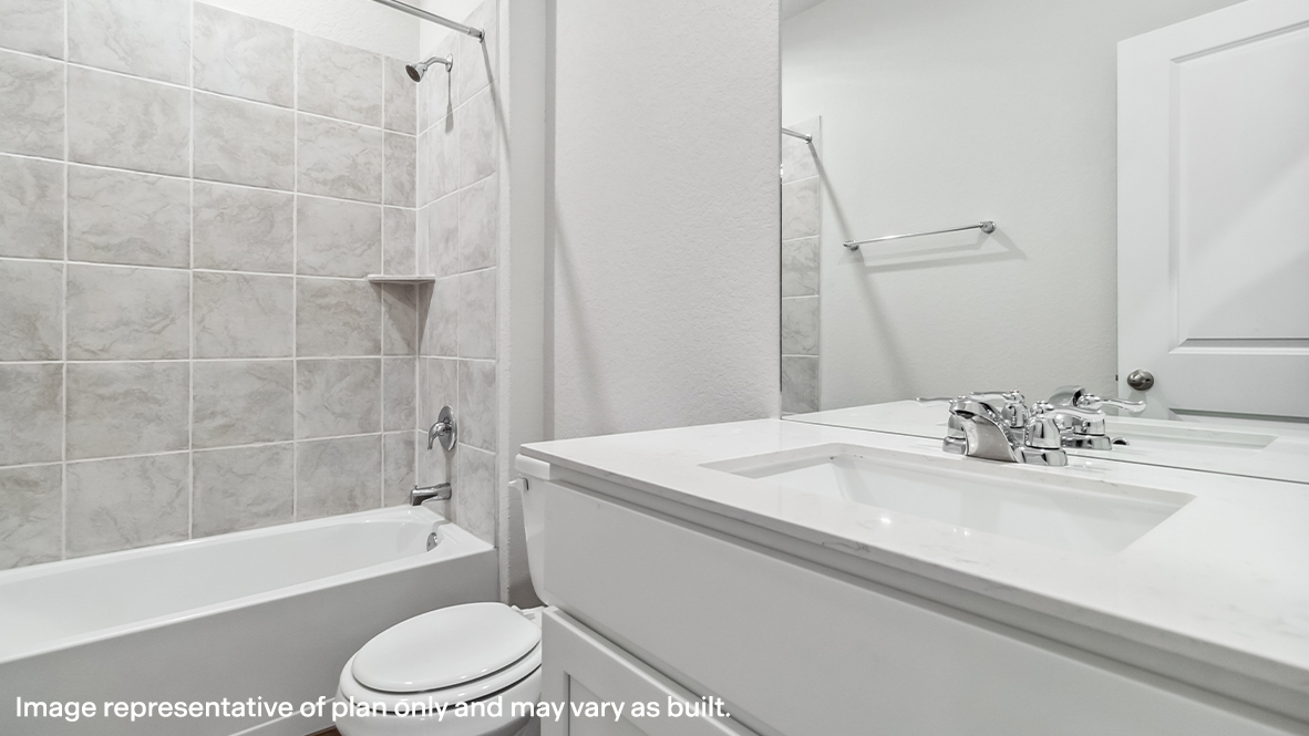 Second full bathroom with combined bathtub and shower, toilet, and single vanity sink.