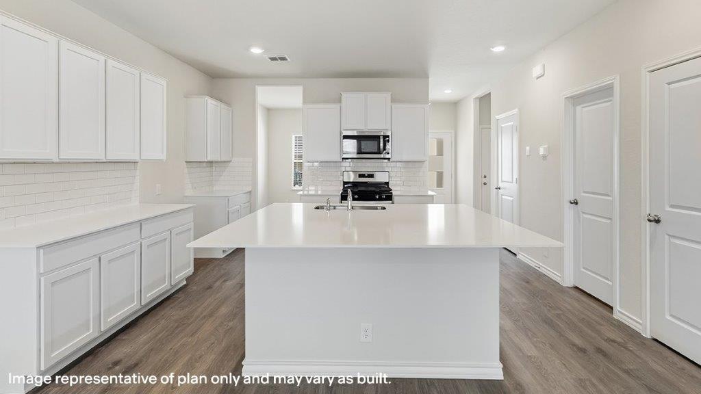 kitchen with plenty of cabinetry