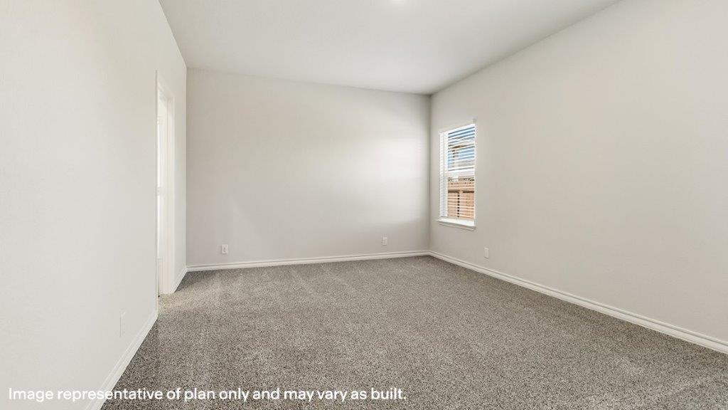 primary bedroom with carpet