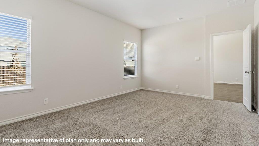 primary bedroom located off the living room