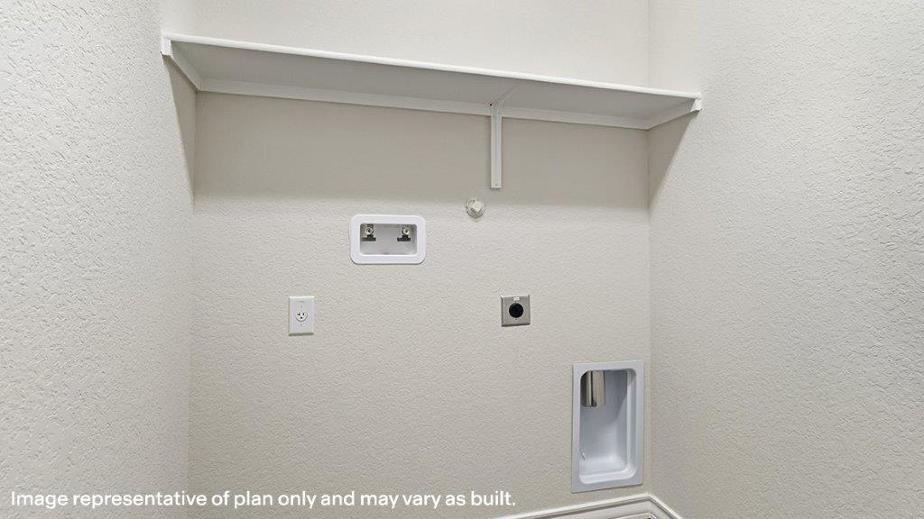 utility room with built in shelving