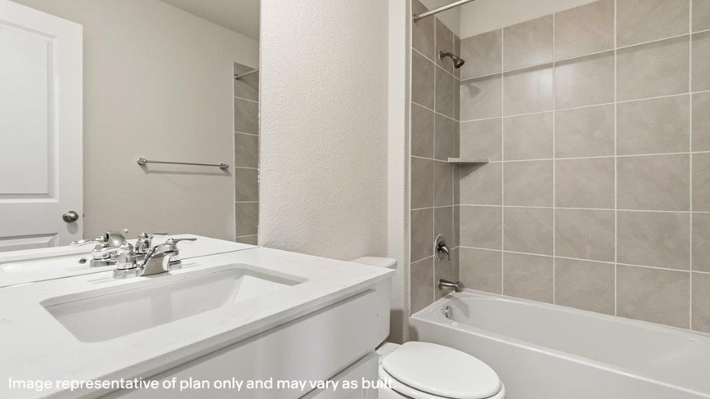 full bathroom with single vanity sink and tub and shower combo