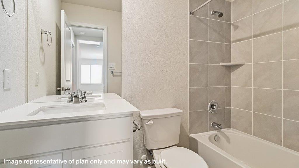 third full bathroom with single vanity sink and tub and shower combo