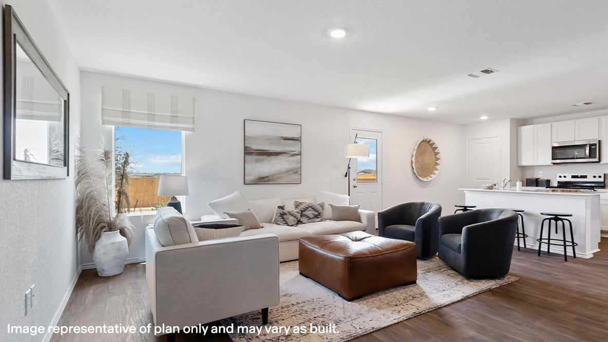 View from kitchen into the dining and living areas, backyard area, showing fresh open design at Stonehill