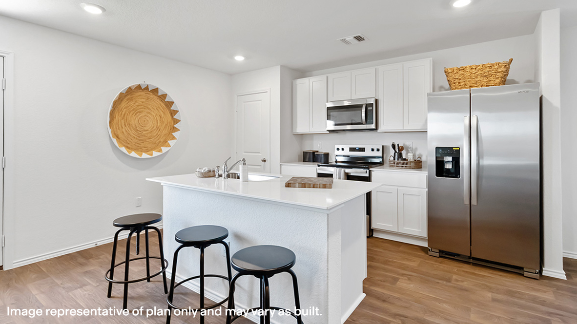 Central kitchen island anchors the home adding a dining option, full sink, pantry and storage, multi-prep zones