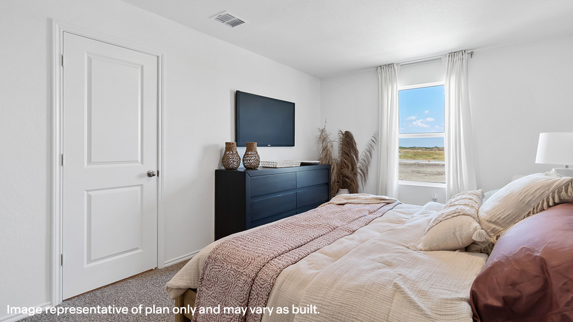 Owner’s suite offers natural window light, spa-inspired ensuite bathroom, backyard view, walk-in closet for everyday style