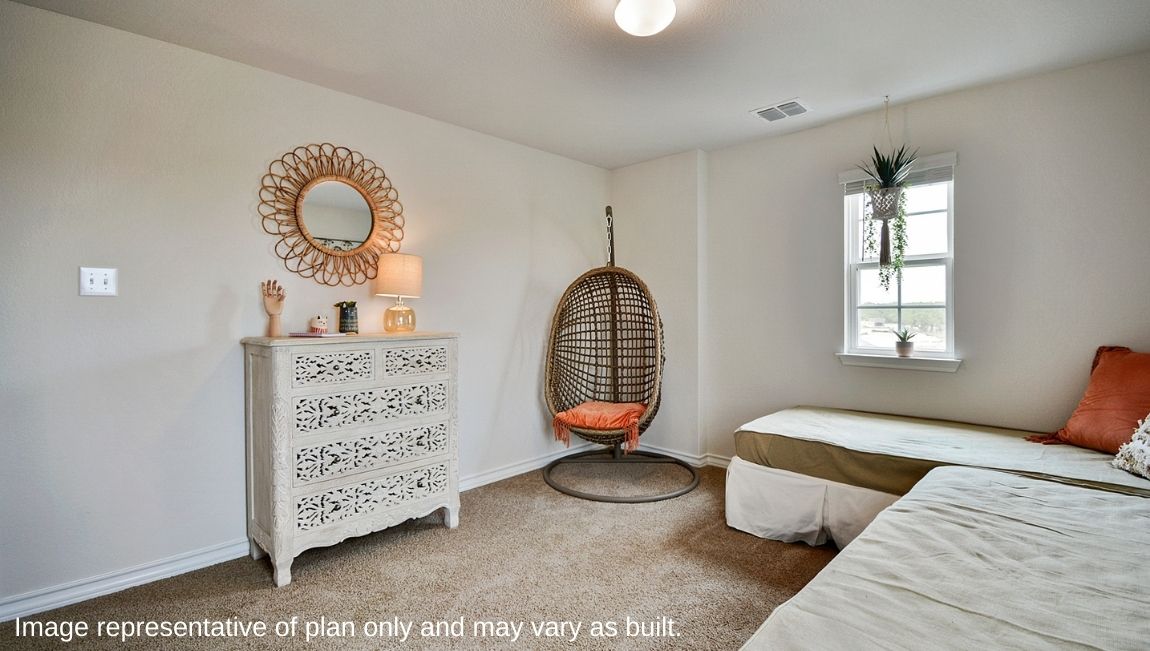 Secondary bedroom with quality carpet, window and closet.