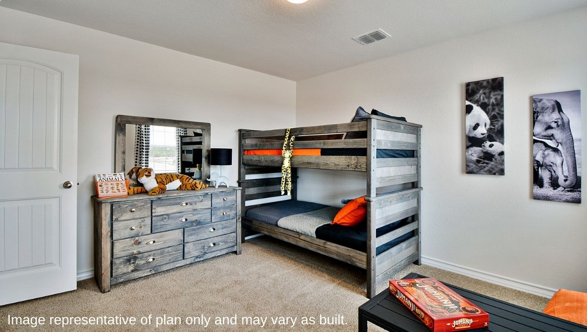 Third bedroom with quality carpet, window and closet.