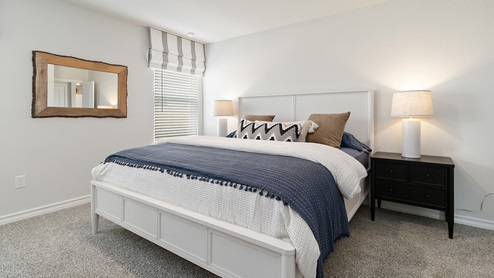 Primary bedroom with quality carpet and ensuite bathroom.