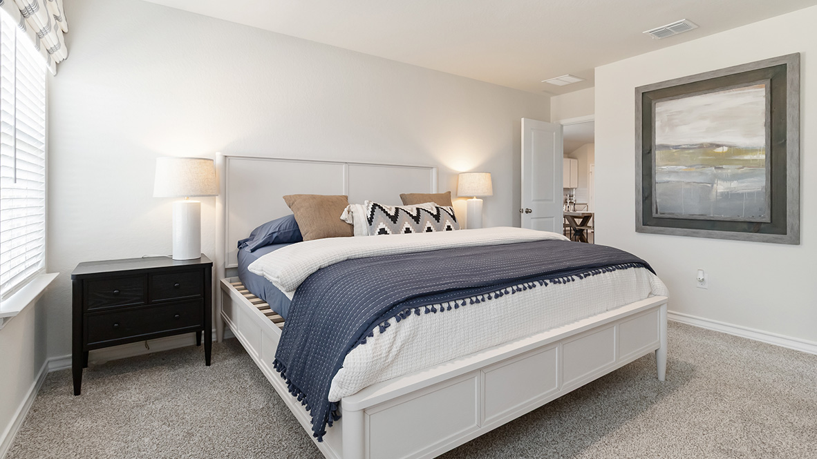 Primary bedroom with quality carpet and ensuite bathroom.