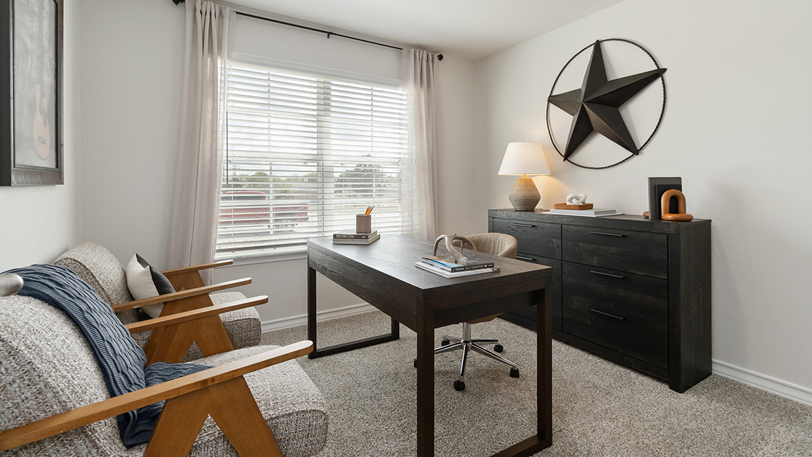 secondary bedroom or flex space with quality carpet flooring and large windows