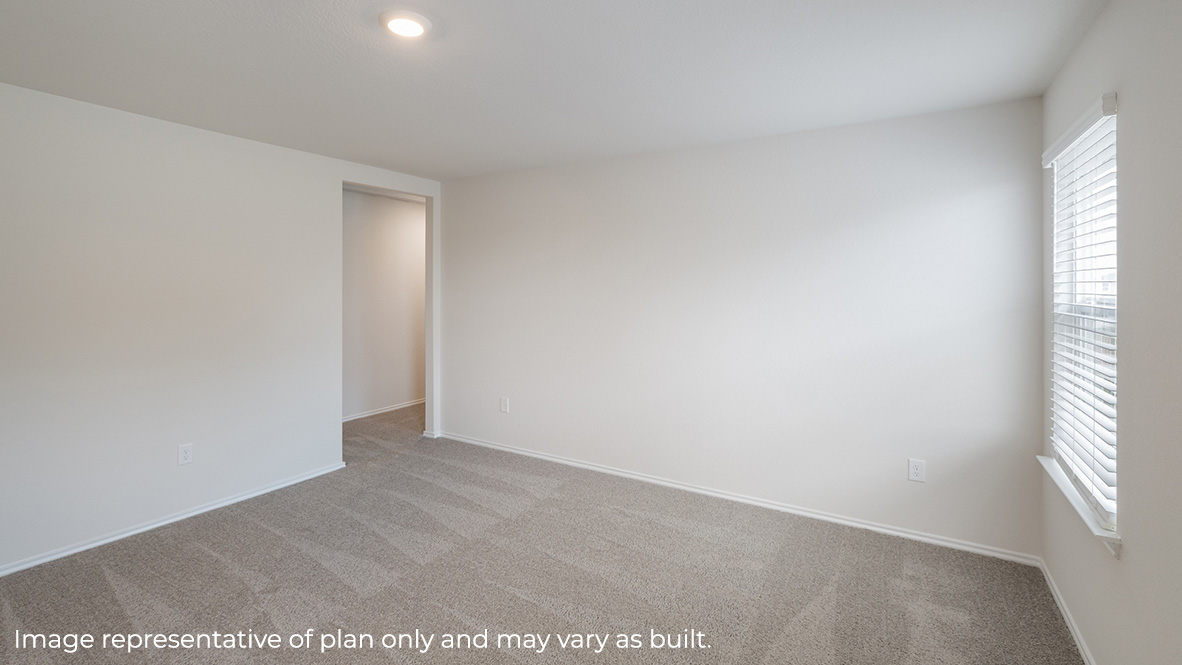 Spacious, open-concept loft with carpet and windows.