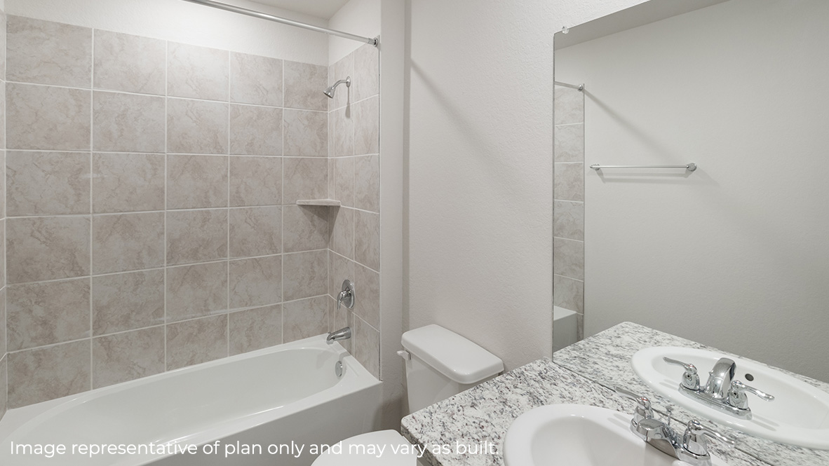 Second full bathroom with combined bathtub and shower, toilet, and single vanity sink.