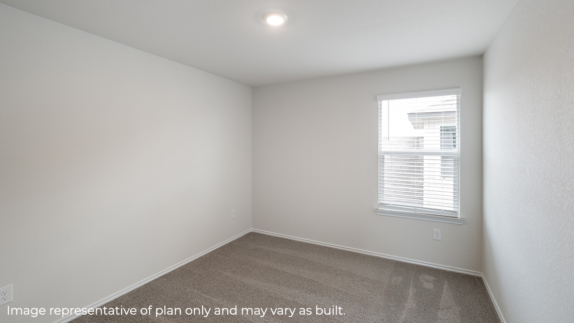 Fourth bedroom with carpet, window and closet.