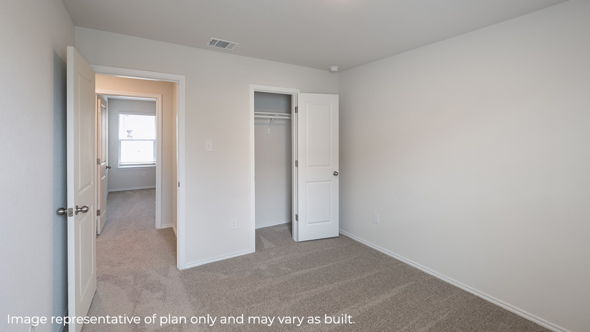 Fourth bedroom closet with shelving.