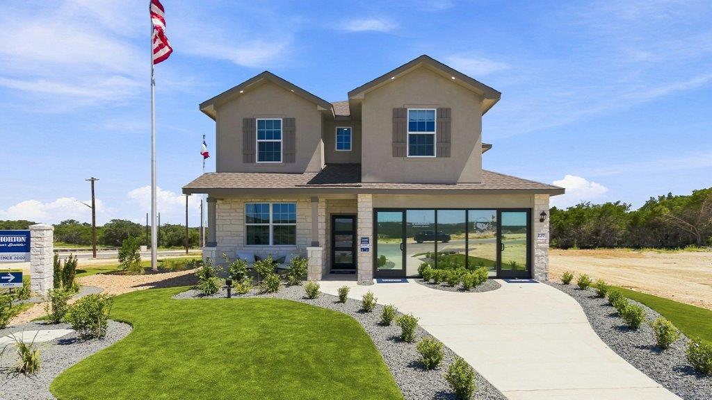 the woodlands at medina hills exterior of model home