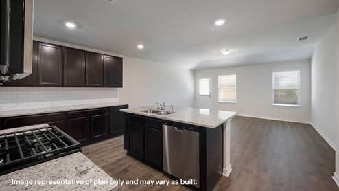 DR Horton San Antonio The Canyons at Amhurst 12018 topaz stream the lombardi floor plan 2 story 2 car garage 2539 square feet open concept kitchen with brown cabinetry stainless steel appliances and spacious kitchen island overlooking living area