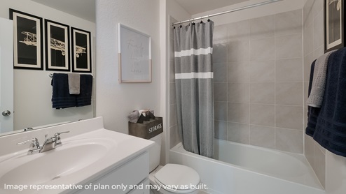 DR Horton San Antonio The Canyons at Amhurst 12010 topaz stream the landry floor plan 2 story 2 car garage 2678 square feet secondary bathroom with single vanity sink white cabinetry toilet and tub and shower combo