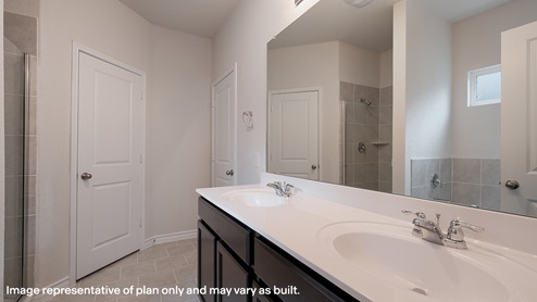 DR Horton San Antonio The Canyons at Amhurst the landry floor plan 2 story 2 car garage 2678 square feet main bedroom ensuite bathroom with walk in shower garden tub and dual vanity sinks