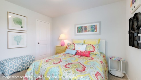 Bulverde Texas DR Horton Homes Copper Canyon The Brown floor plan 1651 square feet one story New Construction Homes children's bedroom with carpet flooring full sized bed with yellow pink and light blue paisley comforter set and matching throw pillows yellow bedside table with pink lamp framed wall art blue and white patterned stools rainbow chevron side table