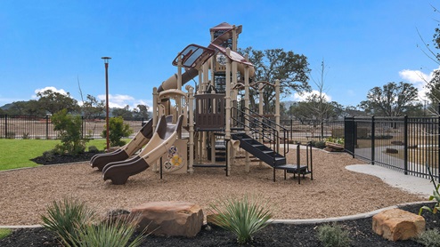 Bulverde Texas DR Horton Homes Copper Canyon New Construction Homes outdoor playground sets with slides jungle gym towers and monkey bars