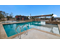 Bulverde Texas DR Horton Homes Copper Canyon New Construction Homes outdoor pool with beach entry splashpad with water features and covered pavilion