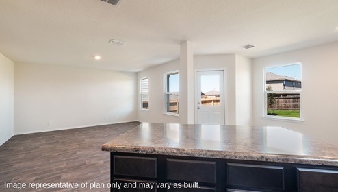 DR Horton San Antonio Laurel Vistas the bowie floor plan 1839 square feet kitchen island with plenty of counterspace and storage overlooking open concept dining area and living room with hard surface flooring throughout