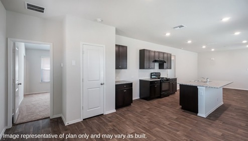 DR Horton San Antonio Laurel Vistas the brooke floor plan 1396 square feet open concept dining area with hard surface flooring flowing to kitchen with pantry, granite countertops, shaker style cabinetry and a kitchen island