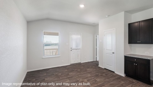 DR Horton San Antonio Laurel Vistas the brooke floor plan 1396 square feet dining area with hard surface flooring, window and doorway to back patio and backyard