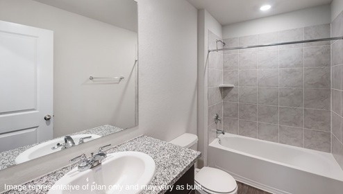 DR Horton San Antonio Laurel Vistas the brooke floor plan 1396 square feet secondary bathroom with single vanity sink, granite countertop, toilet, and combined tub and shower
