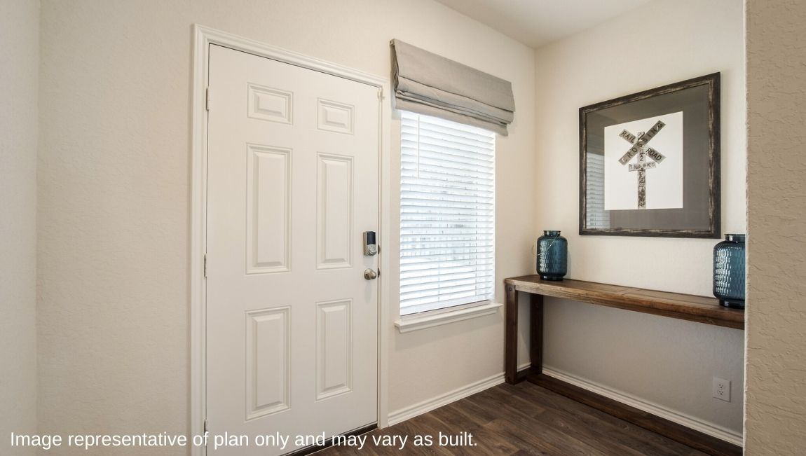 DR Horton San Antonio Laurel Vistas the jasmine floor plan 2182 square feet front door and entry with large window and console table