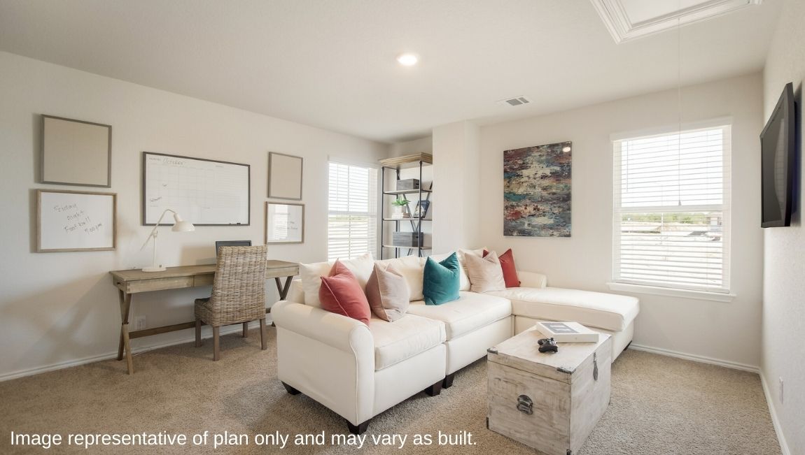 DR Horton San Antonio Laurel Vistas the jasmine floor plan 2182 square feet spacious upstairs loft with plenty of windows, couch, coffee table and writing desks