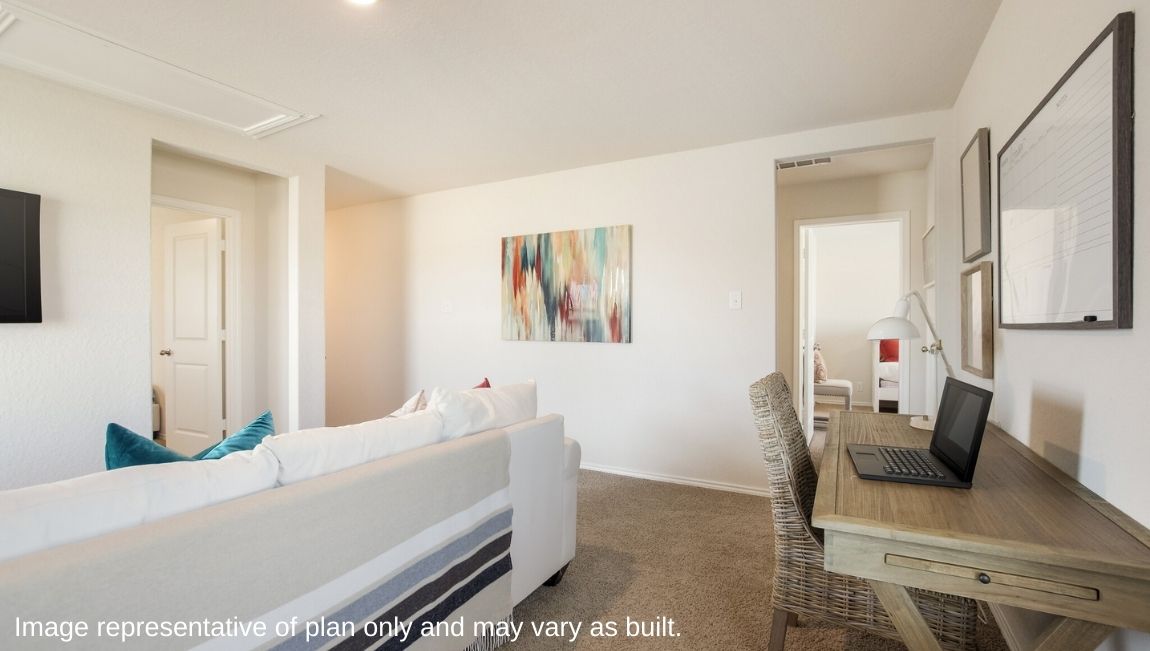 DR Horton San Antonio Laurel Vistas the jasmine floor plan 2182 square feet spacious upstairs loft with plenty of windows, couch, coffee table and writing desk
