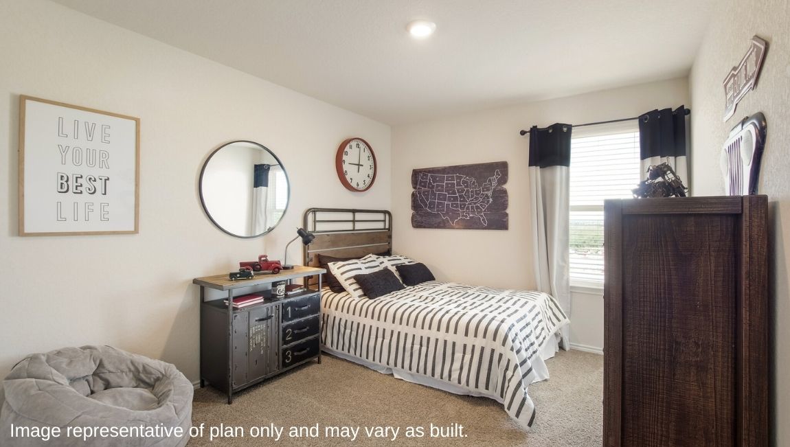 DR Horton San Antonio Laurel Vistas the jasmine floor plan 2182 square feet secondary bedroom with carpet flooring, twin sized bed, dresser and side table