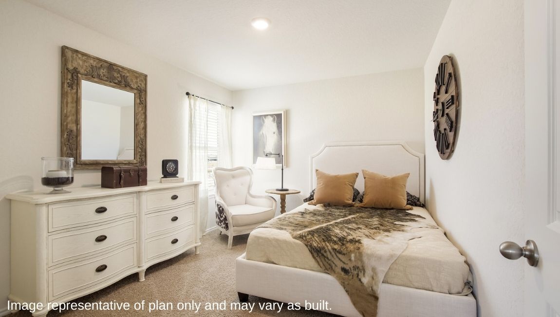DR Horton San Antonio Laurel Vistas the jasmine floor plan 2182 square feet secondary bedroom with carpet flooring, with dresser and vanity mirror, and full sized bed