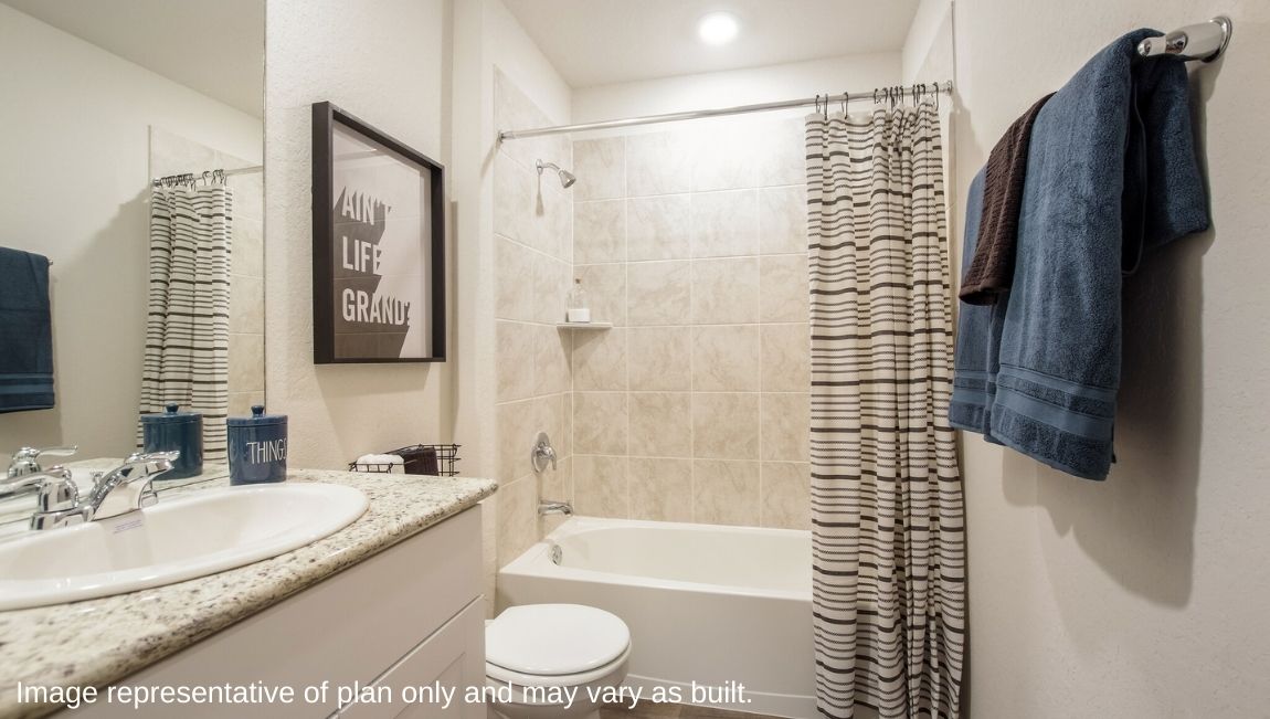 DR Horton San Antonio Laurel Vistas the jasmine floor plan 2182 square feet secondary bathroom with single vanity sink, granite countertop, toilet, and tub and shower combo