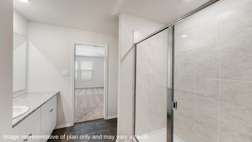 primary bathroom with walk in shower