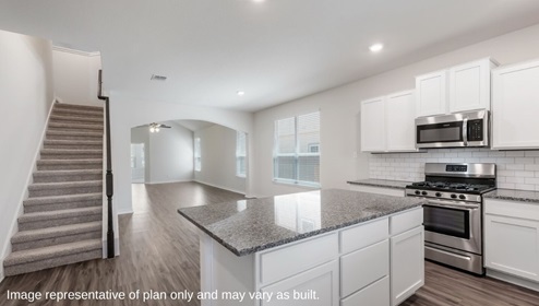 DR Horton San Antonio Riverstone at Westpointe 14032 brazos cove drive the hondo floor plan 2 story 2 car garage 2702 square feet kitchen with white cabinetry stainless steel appliances white subway tile backsplash granite countertops and spacious kitchen island with sink
