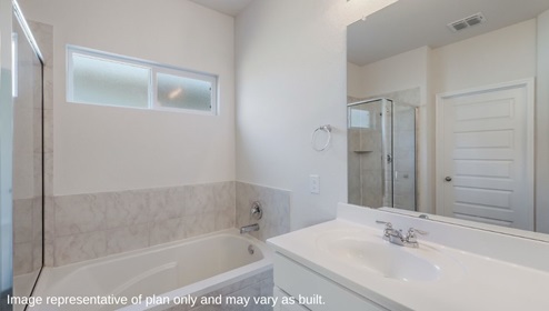 DR Horton San Antonio Riverstone at Westpointe 14032 brazos cove drive the hondo floor plan 2 story 2 car garage 2702 square feet main bedroom ensuite bathroom with dual vanity sinks white cabinetry separate garden tub and walk in shower