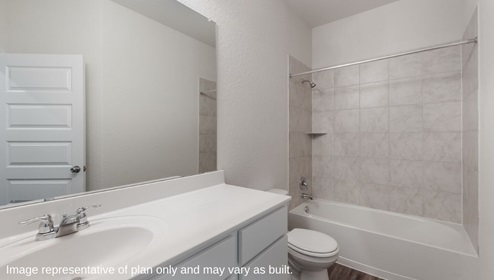 DR Horton San Antonio Riverstone at Westpointe 14032 brazos cove drive the hondo floor plan 2 story 2 car garage 2702 square feet secondary bathroom with single vanity sink white cabinetry toilet and combined tub and shower