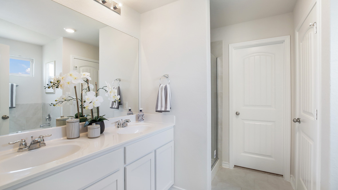 San Antonio Redbird Ranch private master bathroom separate tub and shower dual vanity
