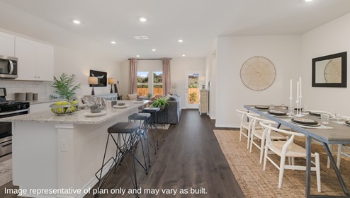 open concept dining room, kitchen and living room