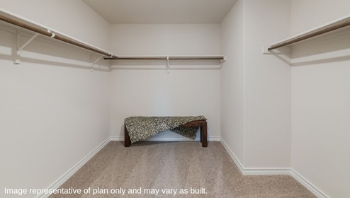 primary bedroom walk in closet