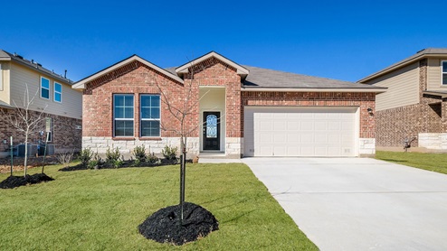 DR Horton San Antonio Riverstone at Westpointe 1 story home with 2 car garage and brick and stone front exterior