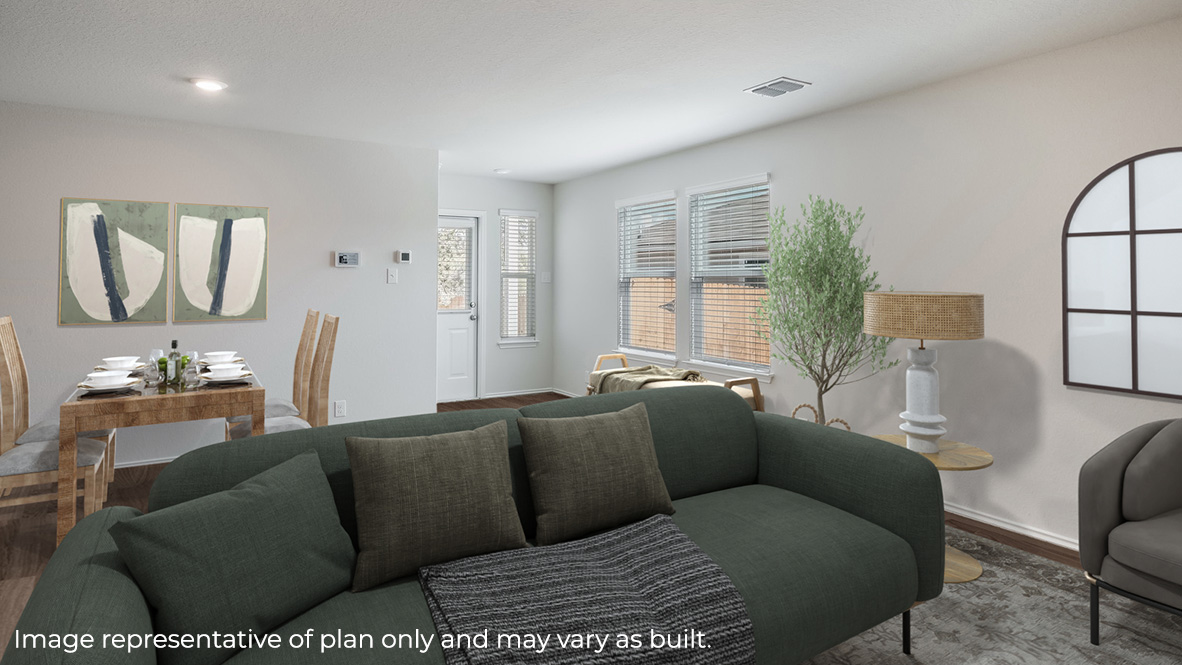 Open-concept living area overlooking dining area.